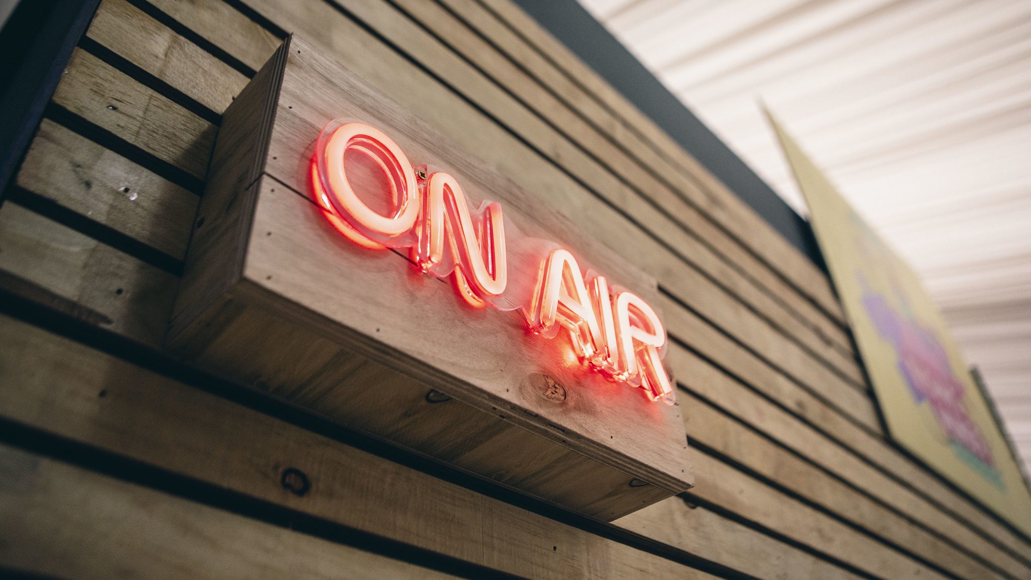 On Air sign on the Rising Minds Radio Booth - cover image for post on young people's mental health