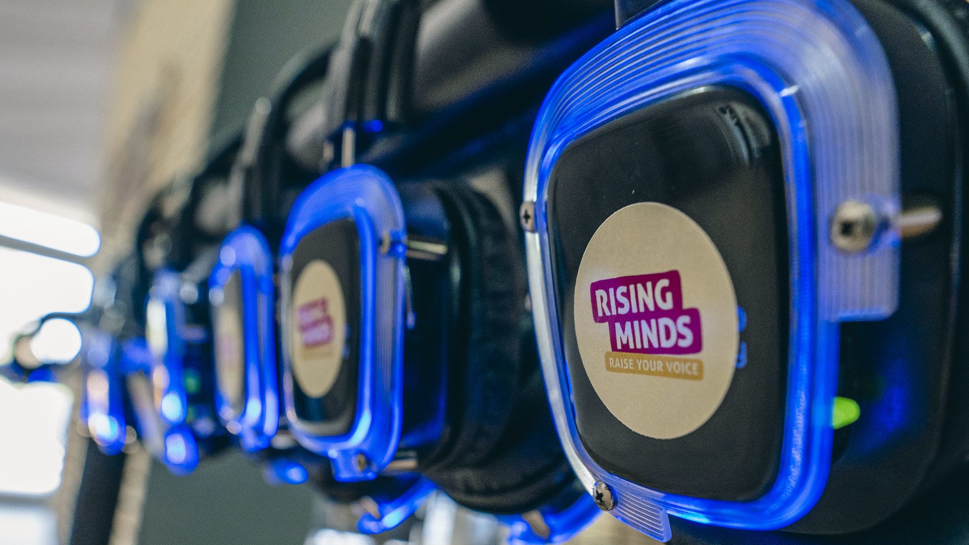 Rising Minds headphones at the Rising Minds Radio Station at Women Deliver 2023.
