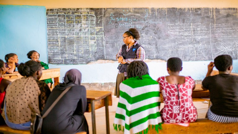 Uwase Aisha leading a YWCA Safe Space for adolescent girls and young women in Rwanda.