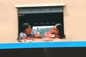 Women on a train in Burma